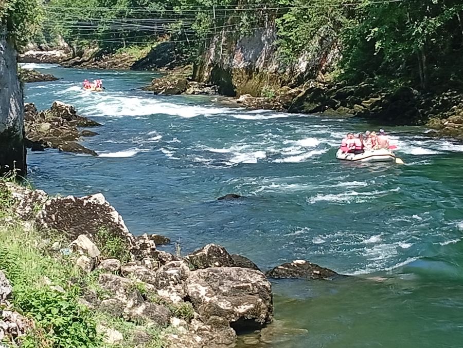 Calm green stretch of the Vrbas river in the Tijesno canyon — kayak and dajak trips from Banja Luka